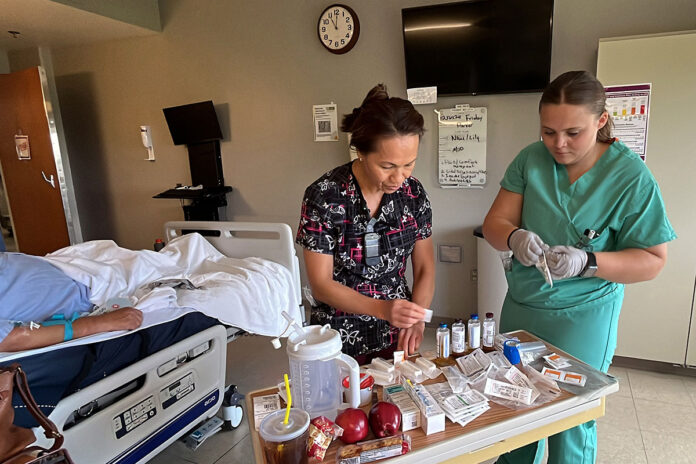 Two college nursing students sacrificed part of their summer break from pursuing their nursing degree to don hospital scrubs to participate in the U.S. Army Nurse Summer Training Program at Blanchfield Army Community Hospital, Fort Campbell, Kentucky, July 5th-31st. (Russell Tafuri, BACH)