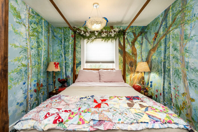 The Snow White Bedroom is one of the many enchanting features of The Storybook Cottage. (Watch The Throne Media)