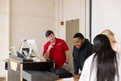 Ethan Schmidt, Austin Peay State University visiting professor of communication, engages students in a public speaking class with an interactive activity. (Ally Shemwell, APSU)