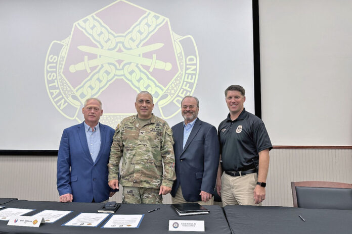 (L to R) James Knight Jr., Mayor of the City of Hopkinsville, Ky.; Fort Campbell Garrison Commander Colonel Christopher Midberry; Eston Glover, Chairman of the Pennyrile Regional Energy Agency; and Adam Smith, Jailer at the Christian County Jail.