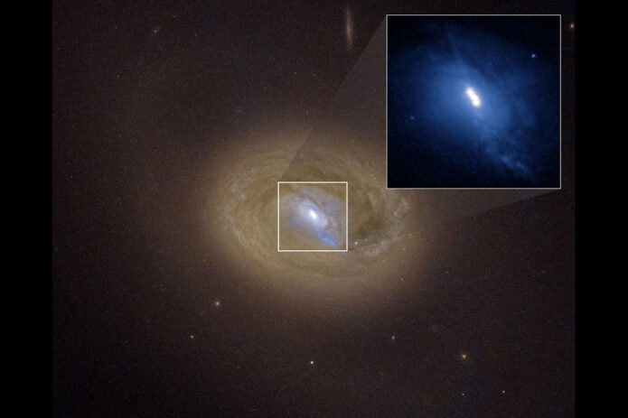 A Hubble Space Telescope visible-light image of the galaxy MCG-03-34-064. Hubble's sharp view reveals three distinct bright spots embedded in a white ellipse at the galaxy's center (expanded in an inset image at upper right). Two of these bright spots are the source of strong X-ray emission, a telltale sign that they are supermassive black holes. The black holes shine brightly because they are converting infalling matter into energy, and blaze across space as active galactic nuclei. Their separation is about 300 light-years. The third spot is a blob of bright gas. The blue streak pointing to the 5 o'clock position may be a jet fired from one of the black holes. The black hole pair is a result of a merger between two galaxies that will eventually collide. (NASA, ESA, Anna Trindade Falcão (CfA); Image Processing: Joseph DePasquale (STScI))