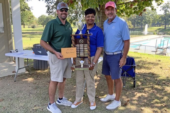Photo of 1st place winners: 34th Annual Mike Foster Golf Scramble Champions Team Planters Bank with HCC President and CEO Dr. Alissa Young.