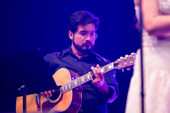 Austin Peay State University alum René Villarreal performs with Fiddlin’ Peayple at F&M Bank Arena. Villarreal previously worked with the ensemble as a graduate teaching assistant. (Sean McCully)