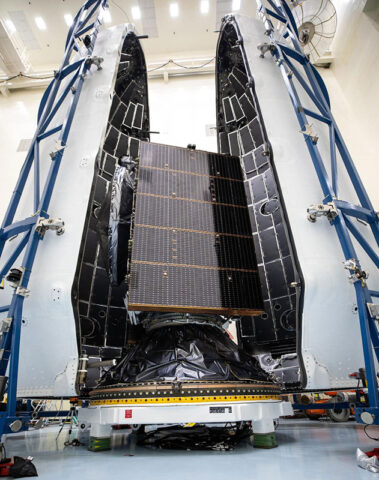 Technicians encapsulated NASA’s Europa Clipper spacecraft inside payload fairings on Wednesday, Oct. 2, at NASA’s Kennedy Space Center in Florida. The fairings will protect the spacecraft during launch as it begins its journey to explore Jupiter’s icy moon Europa. (NASA/Ben Smegelsky)