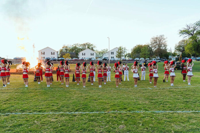 Austin Peay State University’s cheerleading team performs at the Homecoming Bonfire on October 21st at the Dunn Bowl. (Ralph Acosta, APSU)