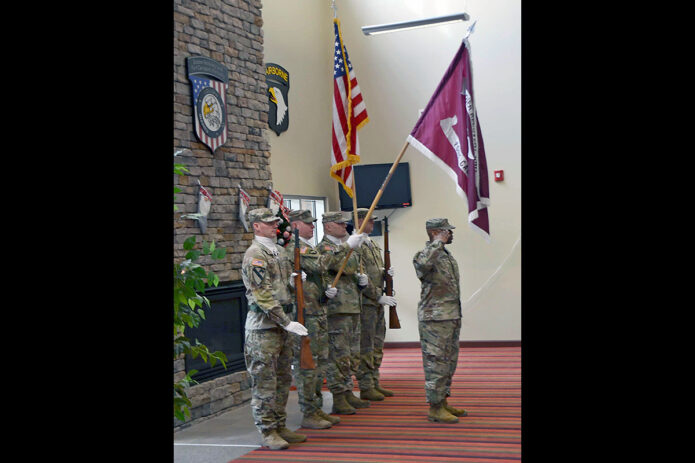 Master of Ceremony, Sgt. 1st Class Brenten Wright leads the Color Guard for the Change of Responsibility Ceremony Dec. 13, 2024, at the Soldier Readiness Unit, Fort Campbell, Kentucky. In the ceremony, Command Sgt. Maj. Bryant Gray relinquished his responsibility following two years of dedicated service to the Soldiers, cadre and staff assigned to the SRU. Members of the color guard included: Staff Sgt. Casey Finn, Staff Sgt. Jonathan Skinner, Staff Sgt. Nikita Ivanov and Staff Sgt. Robert Grizwold. (U.S. Army Photo by Master Sgt. Gina Vaile-Nelson)