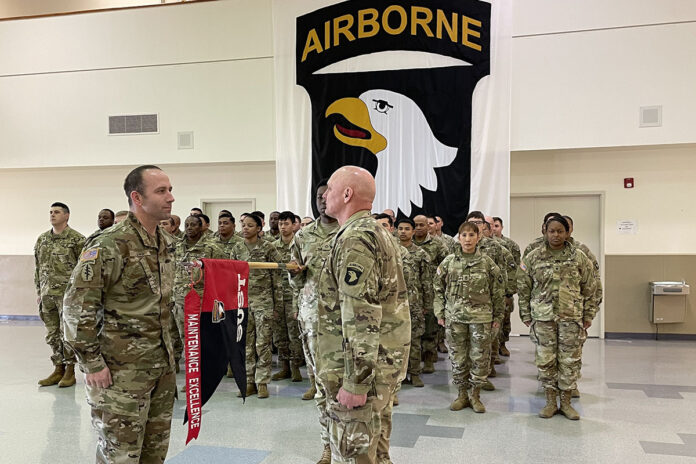 Soldiers assigned to 101st Division Sustainment Brigade, 101st Airborne Division (Air Assault) conduct a ceremony before traveling to the U.S. Southern Border, 6 March 2025 at Fort Campbell, KY. (This photo has been altered for security purposes by blurring out identification badges.)