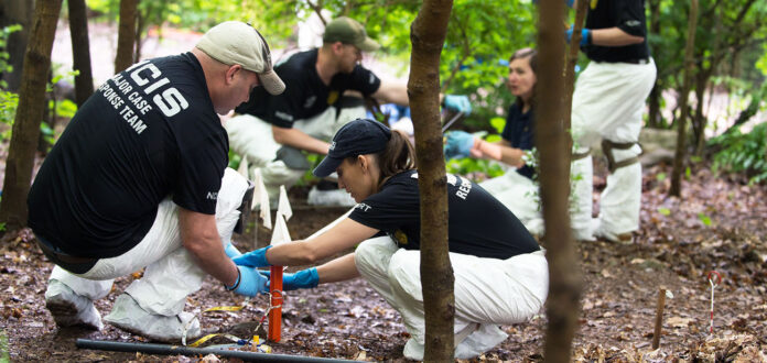 Naval Criminal Investigative Service (NCIS) personnel participate in forensics training at the University of Tennessee Body Farm. This training involves the proper recovery and documentation of human remains. (U.S. Navy photo by Ed Buice/Released)