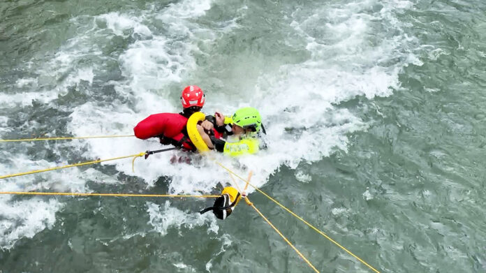 Firefighters from Fort Campbell and surrounding communities gathered April 24 to take part in annual swift water rescue training, a critical preparation designed to enhance safety and effectiveness during high-risk water emergencies. (Jedhel Somera, Fort Campbell Public Affairs Office)
