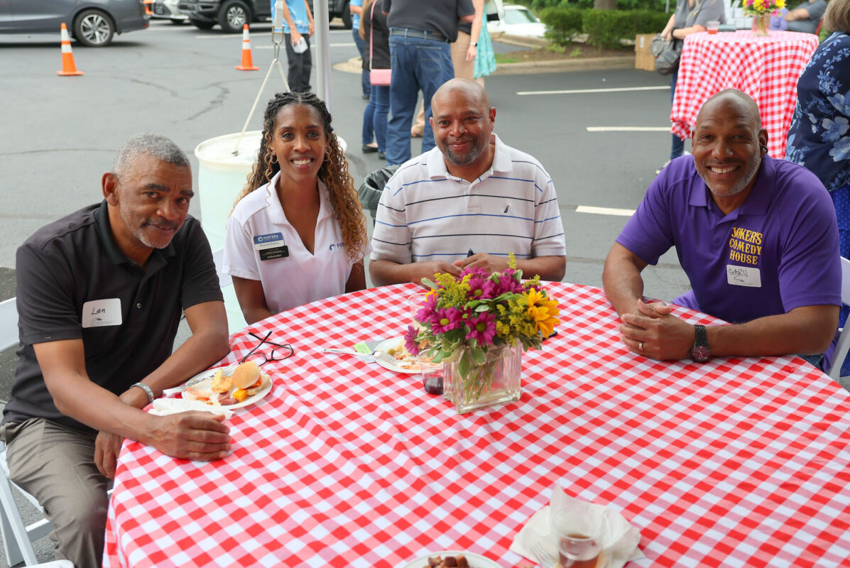 Attendees at the Business After Hours mingle and enjoy refreshments during the event. (Mark Haynes, Clarksville Online)