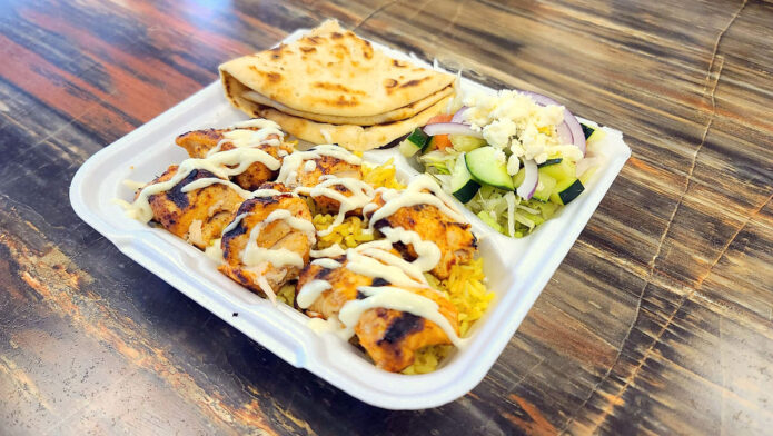 Chicken Kabob over Rice served with Greek Salad