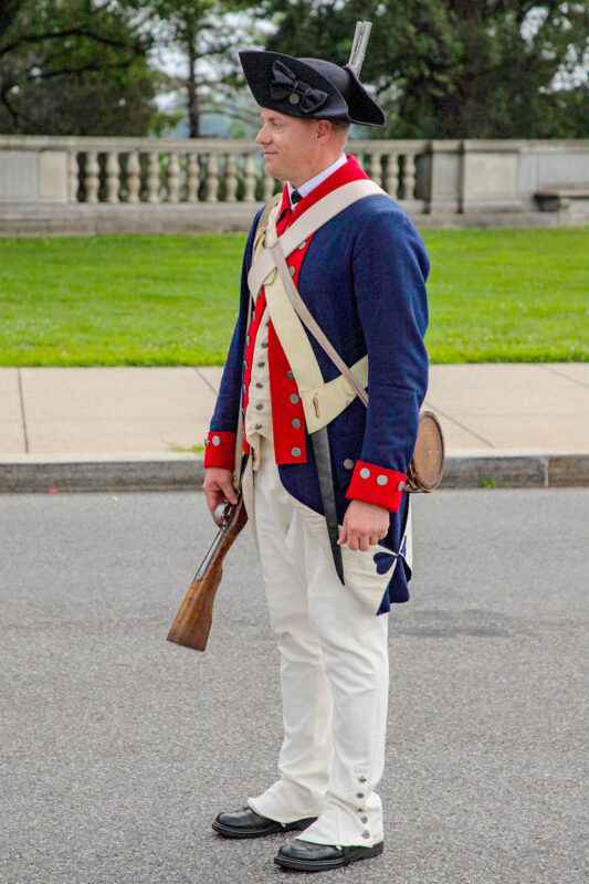 A U.S Army Soldier representing the Revolutionary War era of our nation&#039;s history from the 101st Airborne Division, based out of Fort Campbell, Kentucky, prepares to participate in the 250th Army Birthday Parade, June 14, 2025, in Washington D.C. The parade featured approximately 6,700 Soldiers, 150 vehicles, 50 aircraft, 34 horses, two mules, and one dog to highlight the Army’s 250 years of service to the nation. (U.S. Army photo by Spc. Rebeca Soria)