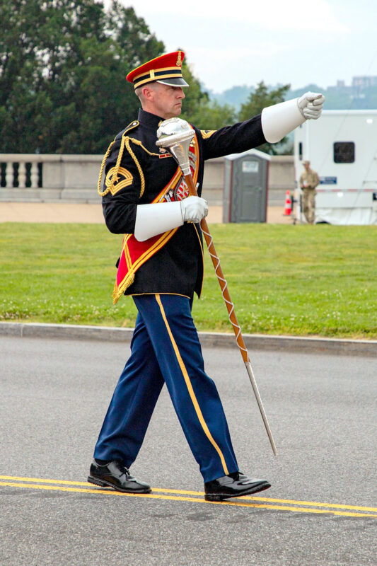 A U.S. Army Soldier with the Army Band, Pershing’s Own, prepares to march in the 250th Army Birthday Parade, June 14, 2025, in Washington D.C. The parade included Soldiers in historical and modern uniforms, marching alongside equipment and vehicles from key eras of Army history to represent how the force has evolved since 1775. (U.S. Army photo by Spc. Rebeca Soria)