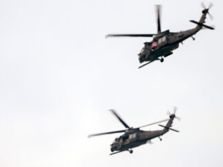U.S. Army MH-60 Jayhawks conduct a flyover as a part of the 250th Army Birthday Parade June 14, 2025, in Washington, D.C. Aircraft were selected to represent each era of the Army including World War II, the Vietnam War, the Gulf War, the Global War on Terrorism, and today’s Army. (U.S. Army photo by Sgt. 1st Class Rakeem Carter)