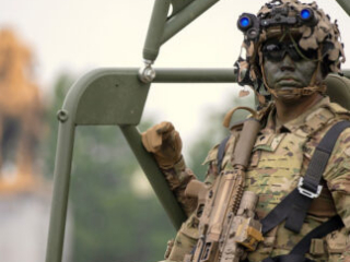 A U.S. Army Soldier assigned to 101st Airborne Division rides in an infantry squad vehicle during the 250th Army Birthday Parade June 14, 2025, in Washington, D.C. The parade recognized the Army’s 250 years of continuous service with marching units, ceremonial elements, and historical displays from every major era. (U.S. Army photo by Sgt. 1st Class Rakeem Carter)