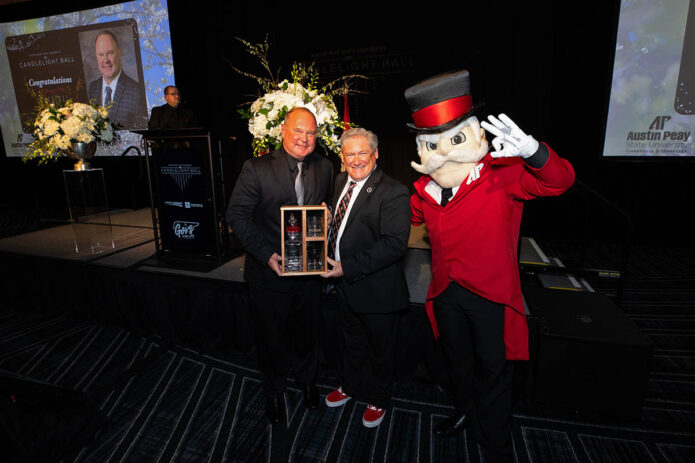 Jeff Truitt receives the 2025 Spirit of Austin Peay Award during the 41st Annual Candlelight Ball. (Sean McCully, APSU)