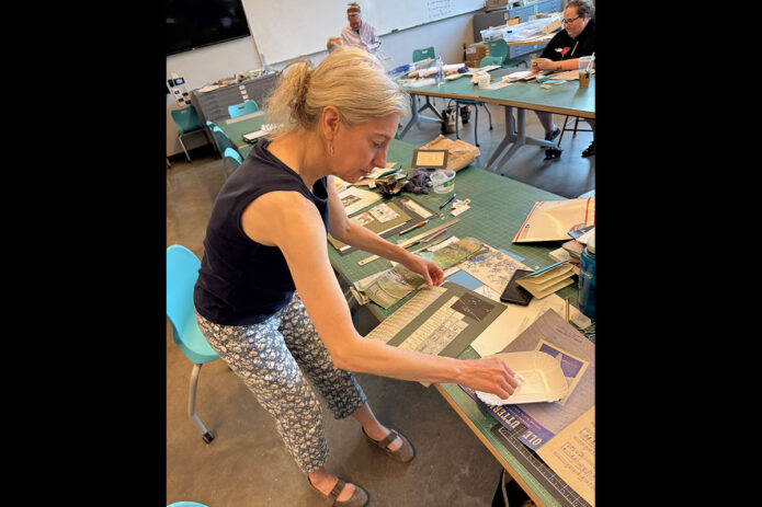 Participant Amy Wright constructing a collage cover