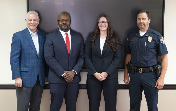 (L to R) Clarksville Mayor Joe Pitts, Ronnie Brown, Lindsey Brown, Clarksville Police Chief Ty Burdine.