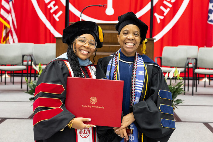 Austin Peay State University alumna Dr. Cavelle McGrath celebrates her graduation with her mother, Dr. Marsha Lyle-Gonga, on August 8th. (Sean McCully, APSU)