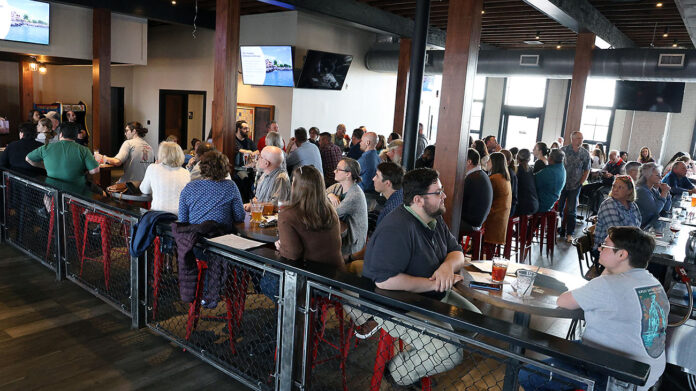Attendees enjoy a Science on Tap event at Strawberry Alley Ale Works, which brings faculty from Austin Peay State University’s College of STEM to present on fascinating topics. (APSU)