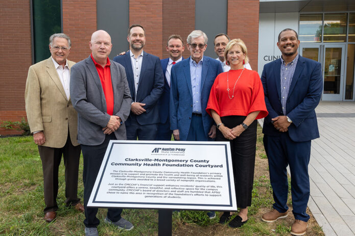 Members of the Clarksville-Montgomery County Community Health Foundation in the Health Professions Building’s CMCCHF Courtyard. (Kate Galloway, APSU)