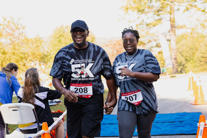 Community members participate in the 2024 Domino’s Run for Govs 5K and Valerie Hunter Kelly Run/Walk for the Govs 1K. (Ralph Acosta)