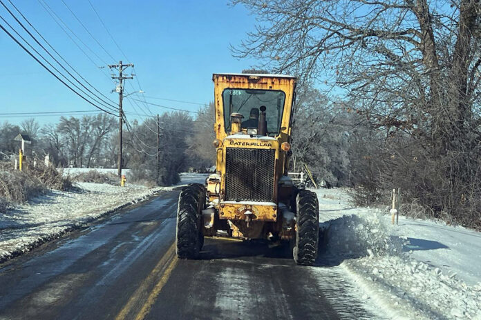 Clarksville Police Department clearing City roads.