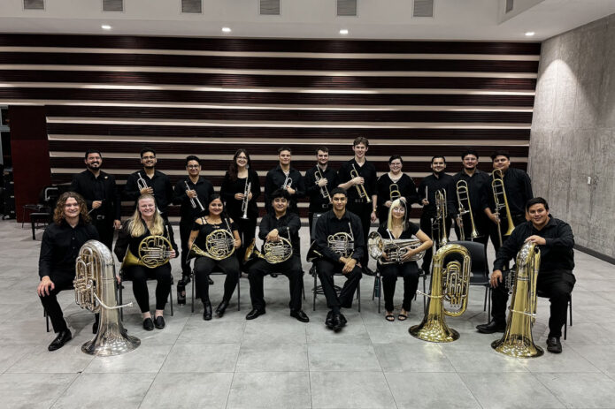 Austin Peay State University’s Aurum Sonor Brass Quintet meets with fellow musicians while in Costa Rica. The ensemble was able to play with both college peers and National Concert Bands during their trip. (Contributed photo)