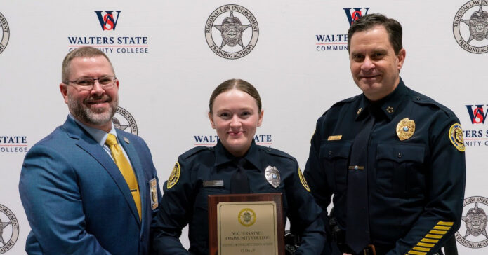 Angel Rushton receiving the Charles Edward Baskette Memorial Award