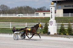 Tip Top Cat with Ronnie Wrenn Jr. winning the $30,000 Open Pace. (Tony Centonze)
