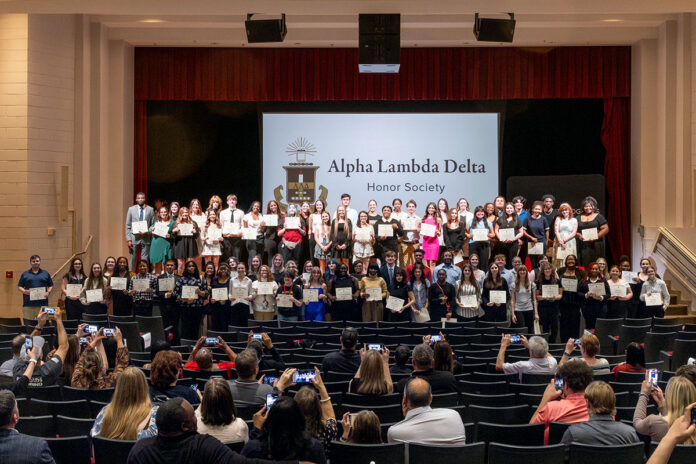 Family members take photos of their newly inducted Alpha Lambda Delta students on March 19th. (Chris Tallent, APSU)
