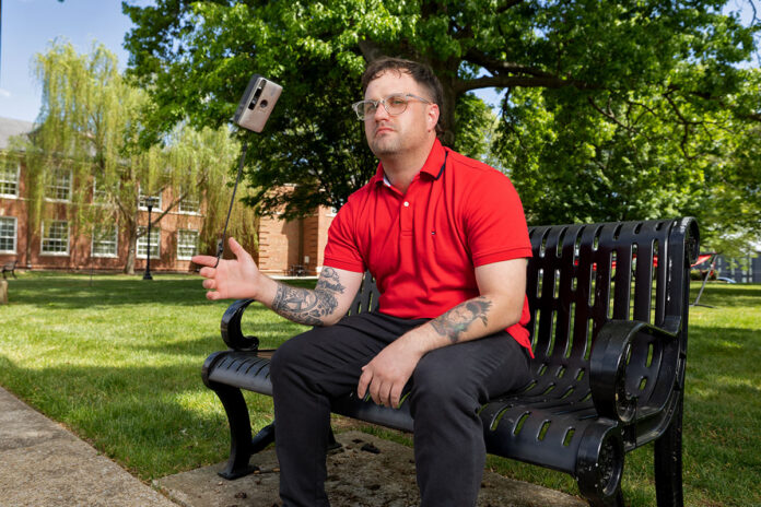 Junior business administration major Cody Hegler, a concert photographer and Army veteran. (Sean McCully, APSU)