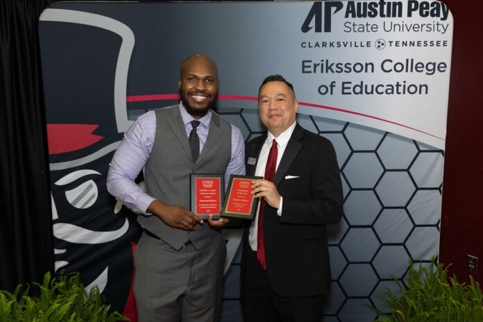 Emmanuel Méjeun, left, Full Spectrum Learning Center director, with Eriksson College of Education Dean Dr. John R. McConnell III at the college's Awards & Celebration Ceremony, April 30th. Méjeun received two of the college’s highest honors for graduate students. (Sean McCully, APSU)