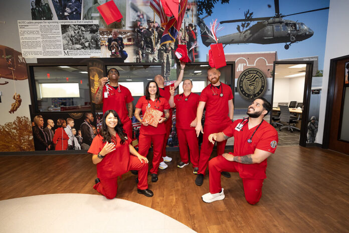 Seven of the 12 AMEDD nursing students graduating from Austin Peay State University this May, from left: Selena Ballard, Leon Britton, Celina Sanchez, Han Him, Wade Harrington, Oliver Timmer, and Kelvin Marcial Rosario. (Sean McCully, APSU)