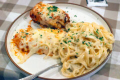 The House Sampler, featuring Lasagna, Fettuccine Alfredo, and Chicken Parmigiana, proved to be one of the most popular dishes ordered throughout the evening. (Mark Haynes, Clarksville Online)
