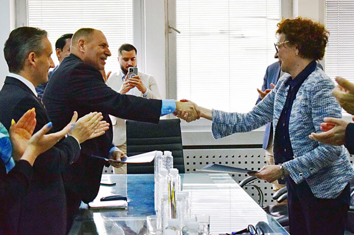 INSMS Director Dr. Rich Mifsud shakes hands with FPN Dean Dr. Maja Kovačević during a signing ceremony formalizing the partnership between APSU and FPN. From left: U.S. Embassy Belgrade Chargé d'Affaires Alexander Titolo, Mifsud, and Kovačević.