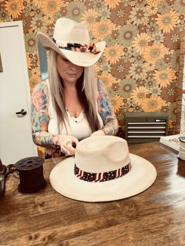Brandi Bazzell Coon styling a Hat