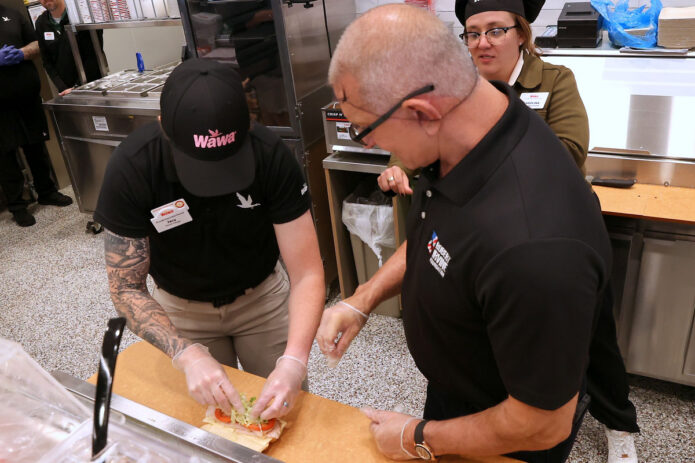 Jacy Van Arkel and Chef Robert Irvine are building the first Wawa Hoagie in Tennessee. (Mark Haynes, Clarksville Online) Jacy Van Arkel and Chef Robert Irvine are building the first Wawa Hoagie in Tennessee.(Mark Haynes, Clarksville Online)