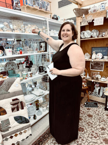 Kellie Crouch at one of booths at The Refinery