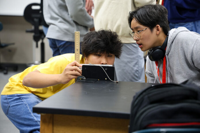 Students take measurements during a classroom activity conducted as part of the Governor’s School for Computational Physics at Austin Peay Satte University. (Colby Wilson, APSU)