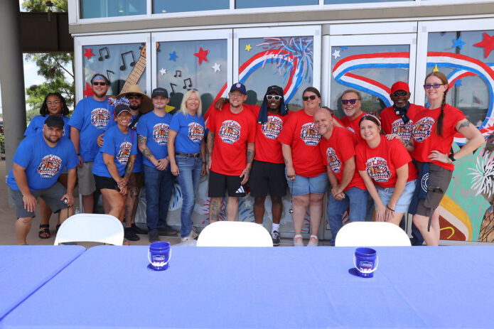 Lowe's employees at the Downtown Commons before the Hot Dog Eating Contest. (Mark Haynes, Clarksville Online)