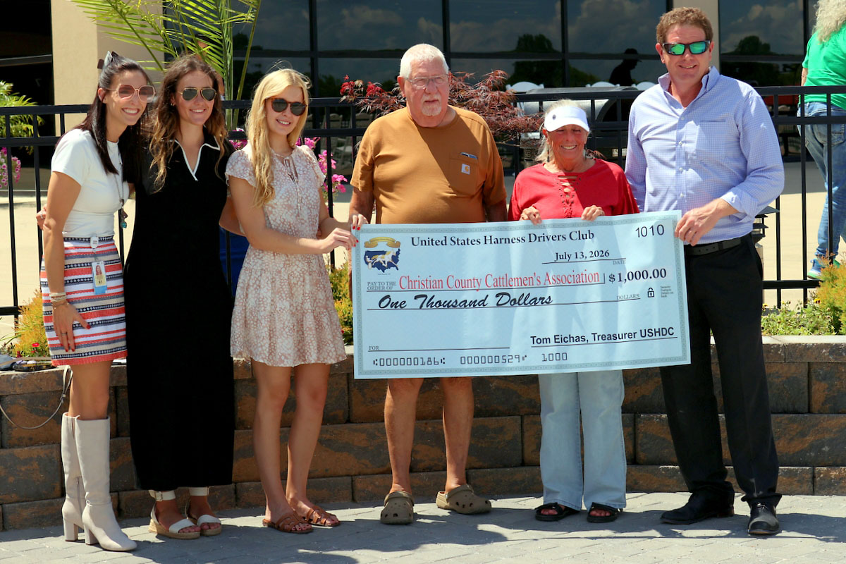 Members of the United States Harness Drivers Club present a $1,000 check to the Christian County Cattlemen's Association during Monday's charity race at Oak Grove Racing, Gaming & Hotel. (Mark Haynes, Clarksville Online) Members of the United States Harness Drivers Club present a $1,000 check to the Christian County Cattlemen's Association during Monday's charity race at Oak Grove Racing, Gaming & Hotel. (Mark Haynes, Clarksville Online)