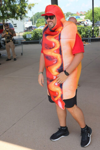 Joseph Brooks, Montgomery County Parks and Recreation events specialist, brings extra fun and excitement to the Lowe's Hot Dog Eating Contest at Downtown Commons while sporting a hot dog costume during Clarksville-Montgomery County's America's 250th Celebration. (Mark Haynes, Clarksville Online)