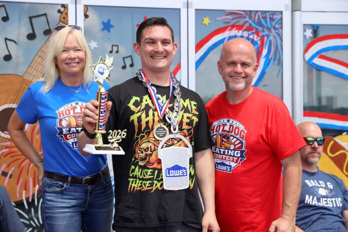 Yvonne Thomas, Lowe's store manager, Joseph Simmons and Sean Hampsey, Lowe's store manager. (Mark Haynes, Clarksville Online)