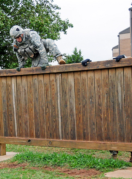 Spc. Christopher Dergosits, a rifleman with Company C, 2nd Battalion, 502nd Infantry Regiment, 2nd Brigade Combat Team, 101st Airborne Division (Air Assault), climbs a short wall during the monthly Iron Strike Challenge at Fort Campbell, KY, September 15th. The competition focuses on physical endurance, teamwork and building camaraderie between the Soldiers. (U.S. Army Photo By Spc. Shawn Denham, PAO, 2nd BCT, 101st Abn. Div.) Spc. Christopher Dergosits, a rifleman with Company C, 2nd Battalion, 502nd Infantry Regiment, 2nd Brigade Combat Team, 101st Airborne Division (Air Assault), climbs a short wall during the monthly Iron Strike Challenge at Fort Campbell, KY, September 15th. The competition focuses on physical endurance, teamwork and building camaraderie between the Soldiers. (U.S. Army Photo By Spc. Shawn Denham, PAO, 2nd BCT, 101st Abn. Div.)