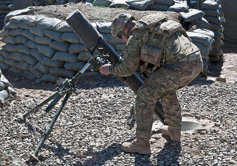U.S. Army Spc. Donavan Dauzat, a mortarman with Company C, 3rd Battalion, 187th Infantry Regiment, 3rd Brigade “Rakkasans,” 101st Airborne Division (Air Assault), adjusts a 120 mm mortar tube during a training exercise, March 1, 2013, at Combat Outpost Bowri Tana. The mortar section trains daily for fire missions. (U.S. Army Photo by Spc. Alex Kirk Amen, 115th Mobile Public Affairs Detachment) U.S. Army Spc. Donavan Dauzat, a mortarman with Company C, 3rd Battalion, 187th Infantry Regiment, 3rd Brigade “Rakkasans,” 101st Airborne Division (Air Assault), adjusts a 120 mm mortar tube during a training exercise, March 1, 2013, at Combat Outpost Bowri Tana. The mortar section trains daily for fire missions. (U.S. Army Photo by Spc. Alex Kirk Amen, 115th Mobile Public Affairs Detachment)