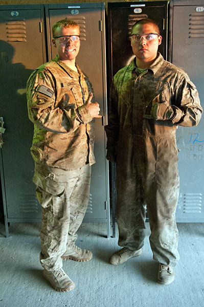Spc. Joshua Finley, allied trade specialist, a native of Cortez, Colo., and Sgt. Joseph Lowery, machinist noncommissioned officer, a native of Leitchfield, Ky., both with E Trooph, 2nd Squadron, 17th Cavalry Regiment pause during the construction of the replacement gate to take a photo Dec. 11. (U.S. Army photo by Sgt. Duncan Brennan, 101st CAB public affairs) Spc. Joshua Finley, allied trade specialist, a native of Cortez, Colo., and Sgt. Joseph Lowery, machinist noncommissioned officer, a native of Leitchfield, Ky., both with E Trooph, 2nd Squadron, 17th Cavalry Regiment pause during the construction of the replacement gate to take a photo Dec. 11. (U.S. Army photo by Sgt. Duncan Brennan, 101st CAB public affairs)