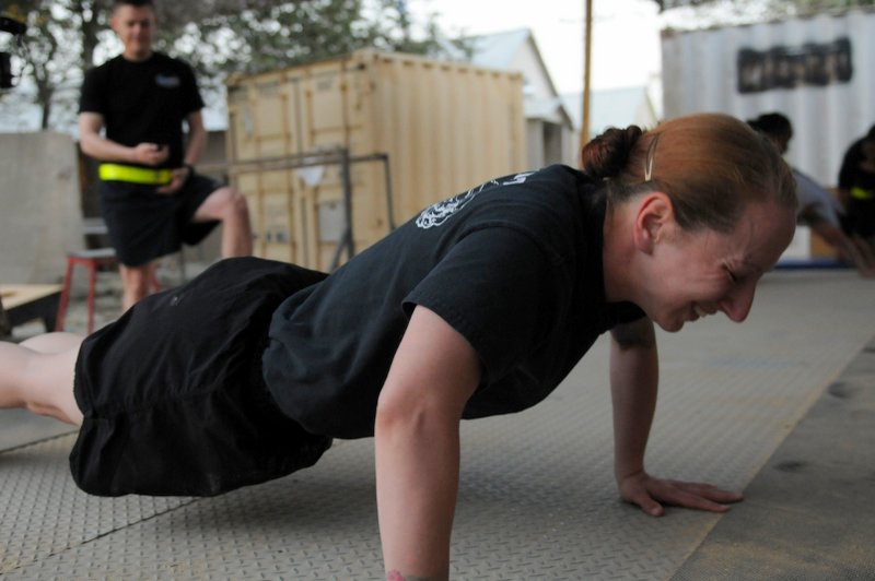 Sgt. Nicole Linn, a native of Baumholder, Germany, and a behavioral health specialist with Task Force Lifeliner, conducts pushups during the 101st Special Troops Battalion Iron Dawg competition, Sept. 28, 2013 at Bagram Air Field, Parwan province, Afghanistan. This competition is to promote espirit de corps within the Task Force Lifeliner units. (U.S. Army photo by Sgt. Sinthia Rosario, Task Force Lifeliner Public Affairs) Sgt. Nicole Linn, a native of Baumholder, Germany, and a behavioral health specialist with Task Force Lifeliner, conducts pushups during the 101st Special Troops Battalion Iron Dawg competition, Sept. 28, 2013 at Bagram Air Field, Parwan province, Afghanistan. This competition is to promote espirit de corps within the Task Force Lifeliner units. (U.S. Army photo by Sgt. Sinthia Rosario, Task Force Lifeliner Public Affairs)