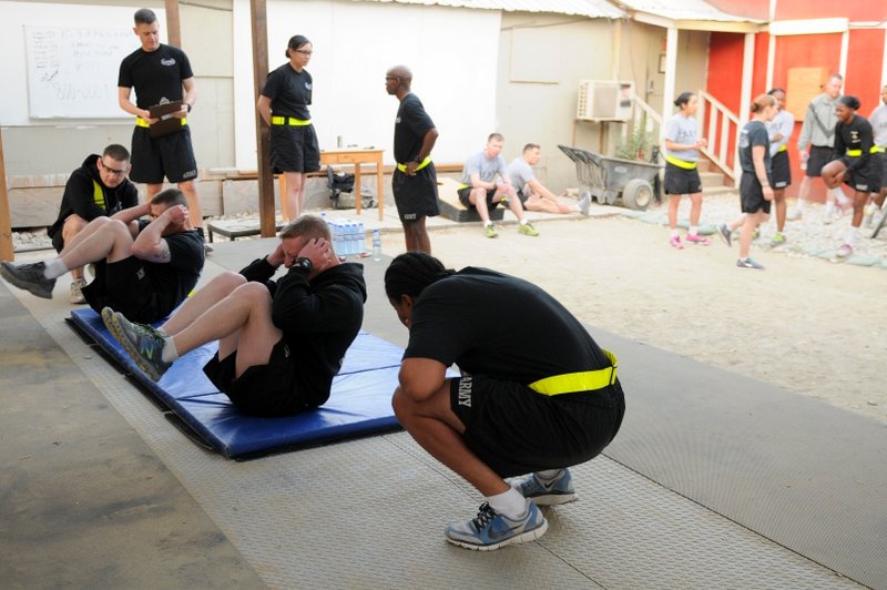 Soldiers with Task Force Lifeliner conduct situps during the 101st Special Troops Battalion Iron Dawg competition, Sept. 28, 2013 at Bagram Air Field, Parwan province, Afghanistan. This competition is to promote espirit de corps within the Task Force Lifeliner units. (U.S. Army photo by Sgt. Sinthia Rosario, Task Force Lifeliner Public Affairs) Soldiers with Task Force Lifeliner conduct situps during the 101st Special Troops Battalion Iron Dawg competition, Sept. 28, 2013 at Bagram Air Field, Parwan province, Afghanistan. This competition is to promote espirit de corps within the Task Force Lifeliner units. (U.S. Army photo by Sgt. Sinthia Rosario, Task Force Lifeliner Public Affairs)