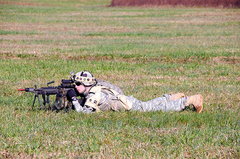 Spc. Anthony Euganeo, a rifleman with Company D, 1st Battalion, 502nd Infantry Regiment, 2nd Brigade Combat Team, 101st Airborne Division (Air Assault) pulls security during a patrol to a key leadership engagement during Strike Blitz training at Fort Campbell, Dec. 1st, 2011. Strike Blitz trains Soldiers on the real-life combat situations they can expect to see on deployment. Spc. Anthony Euganeo, a rifleman with Company D, 1st Battalion, 502nd Infantry Regiment, 2nd Brigade Combat Team, 101st Airborne Division (Air Assault) pulls security during a patrol to a key leadership engagement during Strike Blitz training at Fort Campbell, Dec. 1st, 2011. Strike Blitz trains Soldiers on the real-life combat situations they can expect to see on deployment.